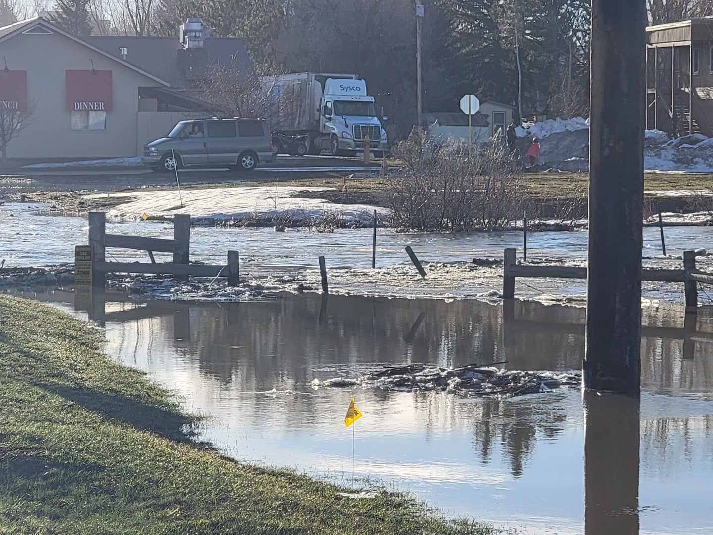PHOTOS Flooding causes closures in Hayden